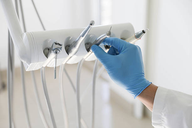 Professional Tooth Extraction technician working in Collinsville, IL